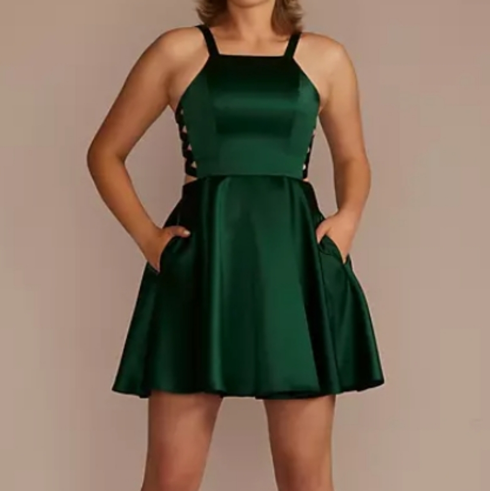 A short green prom/homecoming dress.